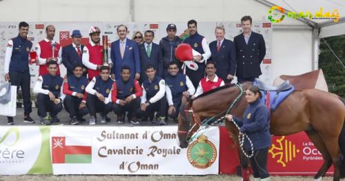 Members of Royal Cavalry of Oman celebrate after the conclusion of 160km French Florac Endurance Race in France.