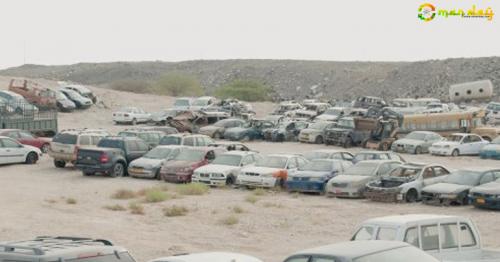 Old trash bins, cars near Seeb pose environmental hazard