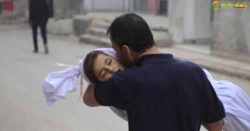 Heartbreaking photo of Syrian father holding daughter&rsquo;s body before funeral
