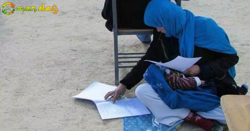 
Afghan Woman Takes Exam While Nursing Her Baby. Incredible Pic Is Viral