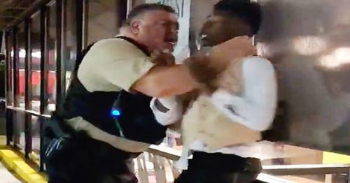 Video of white police officer choking black man in prom tux goes viral
