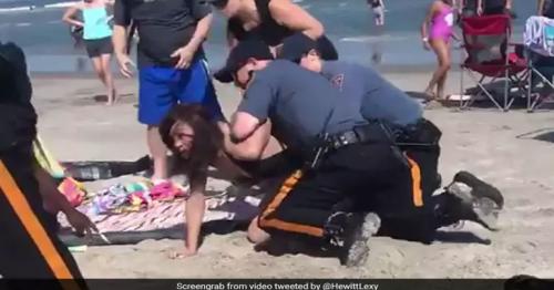 VIDEO: New Jersey cop punches a woman in the head during an arrest