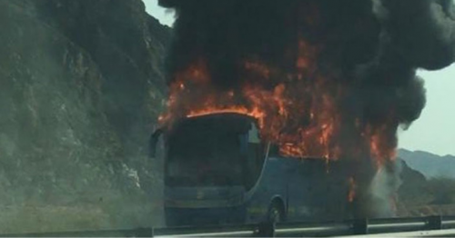 Transport bus, catches fire , Muscat-Nizwa Road