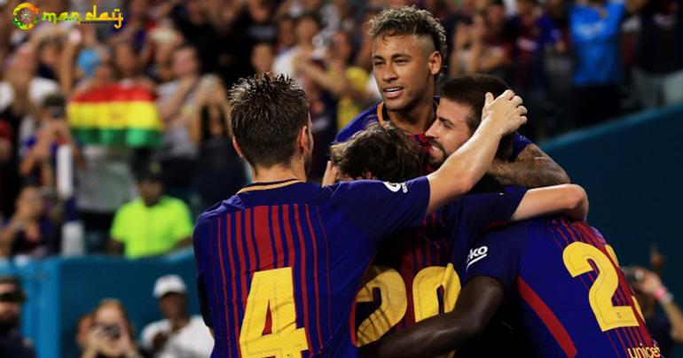 Barcelona celebrate a goal against Real Madrid