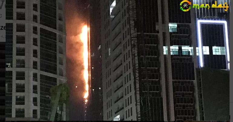 Flames shoot up the side of the Torch tower residential building in the Marina district, Dubai, United Arab Emirates, August 4, 2017. 