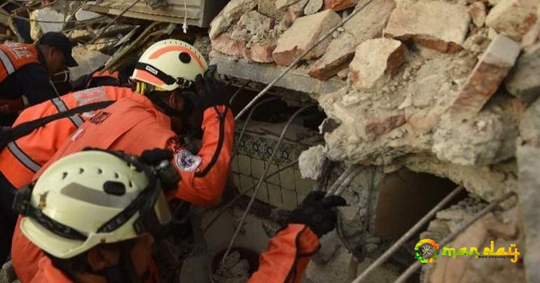 Death toll 61 in Mexico quake as hurricane hits Gulf coast