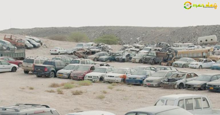Old trash bins, cars near Seeb pose environmental hazard